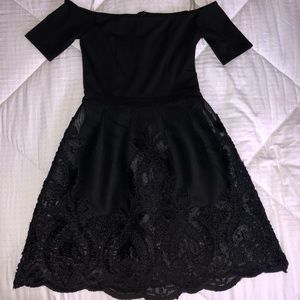 Francesca’s black midi dress